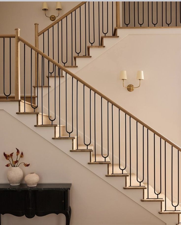 Garde-corps en acier et bois sur un escalier intérieur
